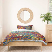 Red bedding duvet and pillowcases with vivid animal-skin style pattern, blue and green details
