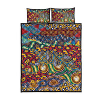 Quilt bed set with matching two-square pillows, colorful animal-skin inspired pattern
