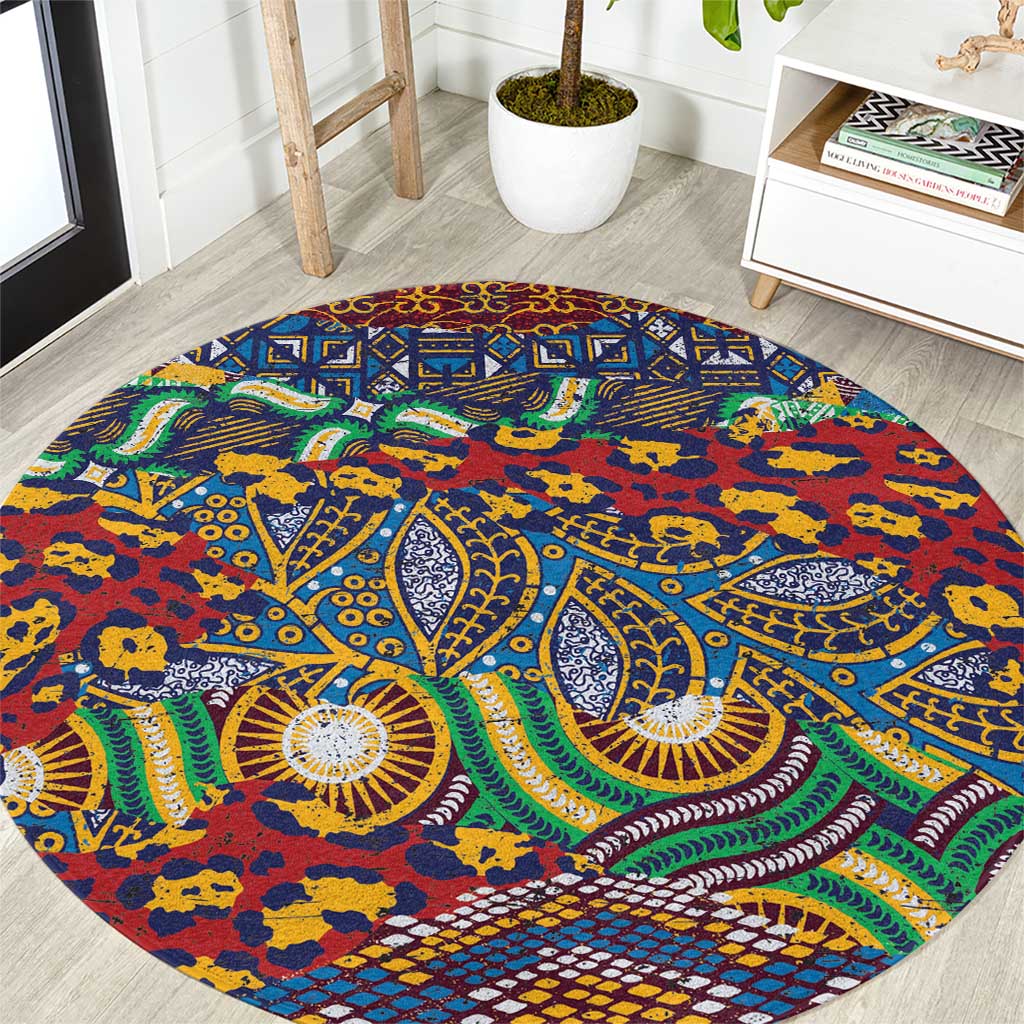 Round tribal rug with circular animal-skin pattern, blue with red and green accents