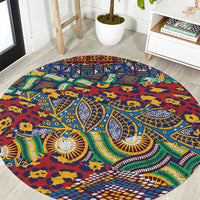 Round tribal rug with circular animal-skin pattern, blue with red and green accents
