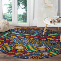 Round tribal rug with blue, red, and green animal-skin design across living room floor