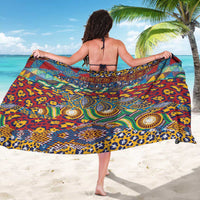 Animal-skin patterned sarong wrap featuring circular medallion prints, multicolor
