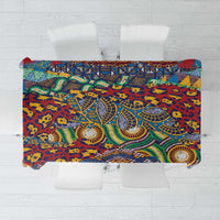 Colorful animal-skin pattern tablecloth with geometric borders in red, blue, green, yellow