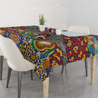 Rectangular animal-skin motif tablecloth in blue and yellow with red and green accents
