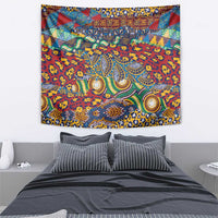 Red animal-skin pattern tapestry with bright blue and yellow central design