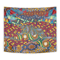 Close red animal-skin pattern tapestry with teal snake-like figures and round motifs