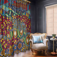 Colorful patterned window curtains with red base and ornate motifs, hanging to the floor