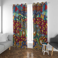 Red, blue, and yellow patterned window curtains with ornate central medallion motifs