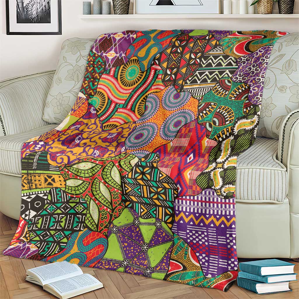 Traditional ethnic African motifs blanket on armchair, bright multicolor geometric and animal motifs