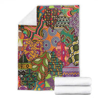 Traditional ethnic African motifs blanket folded, multicolor geometric and curving design