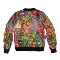 Bomber jacket with bold colorful vintage motifs, black ribbed collar, back view