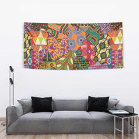 Multicolor African motif tapestry with bold shapes and repeating borders, rectangular