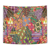 Close-up multicolor African motif tapestry panel with swirling center, detailed textile patterns