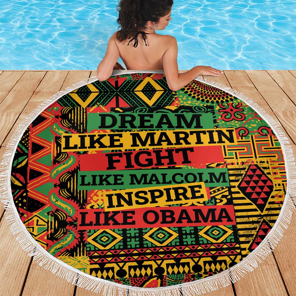Round beach blanket with white fringe and “DREAM LIKE MARTIN FIGHT…” text