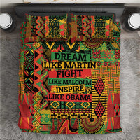 Colorful patterned bedding set with bold central text design and two matching pillowcases