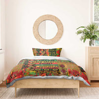 Colorful bedding set with central quote text and geometric patterns, paired with pillowcases
