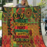 Multicolor dream-themed quilt with bold text in rows and patterned borders.