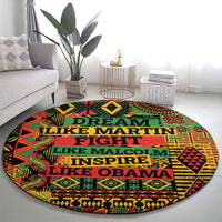 Round area rug with vibrant geometric design and stacked slogan text in dark green and yellow