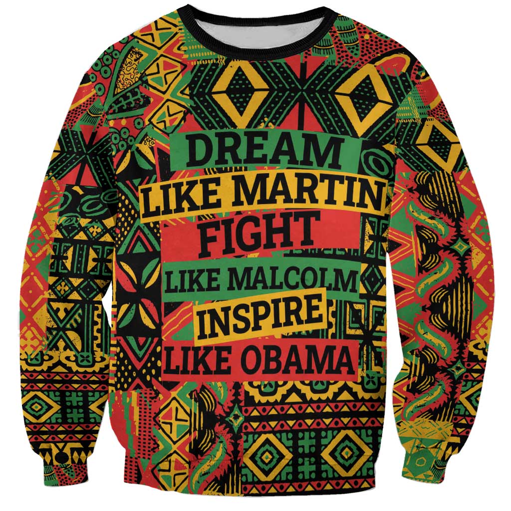 Multicolor sweatshirt with bold text graphic: DREAM LIKE MARTIN, FIGHT LIKE MALCOLM