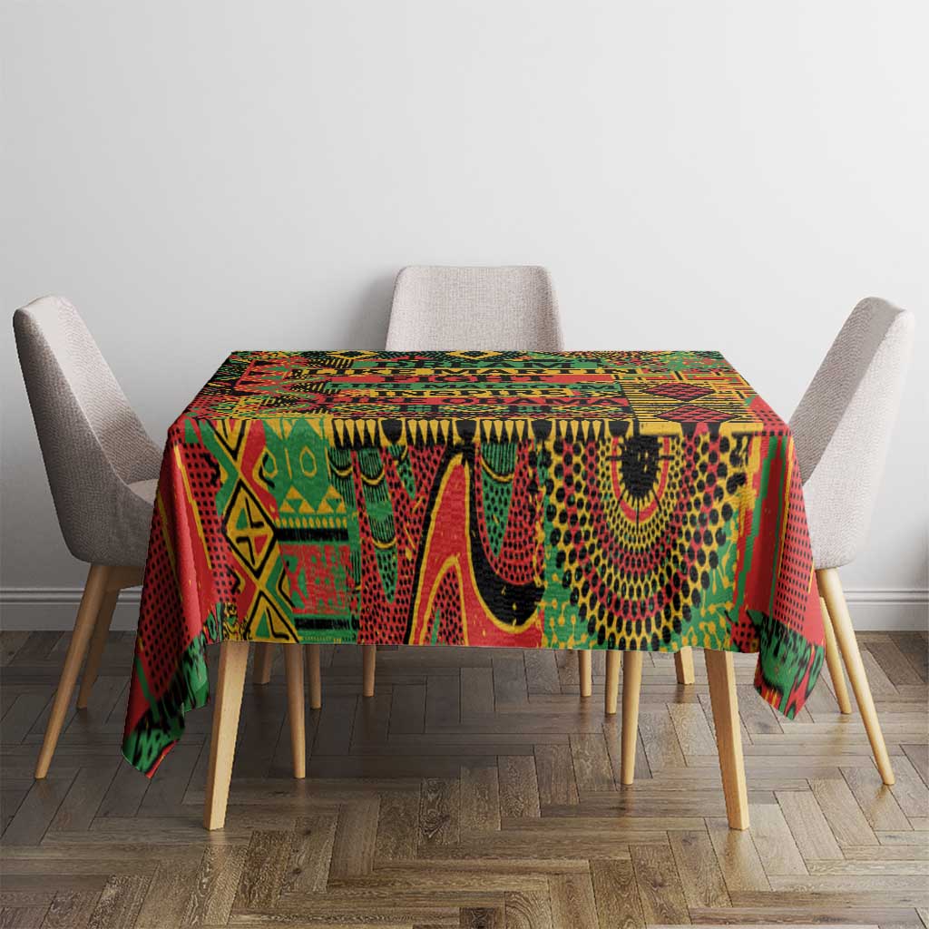Colorful geometric tablecloth with decorative edge on dining table in green and red