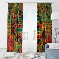 Set of multicolor geometric window curtains with printed text over a bed room window
