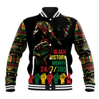Black baseball jacket with colorful patterned sleeves and front character graphic, button-up