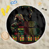 Black round beach blanket with fringe, bold Black History Month text and portraits
