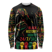 Black long-sleeve shirt with colorful African-inspired patterns and Black History Month text