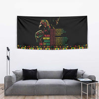 Black tapestry with portrait and Black History Month message, vibrant patterned edge