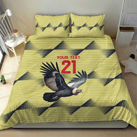 Yellow bedding set with condor graphic and 21, includes two pillowcases
