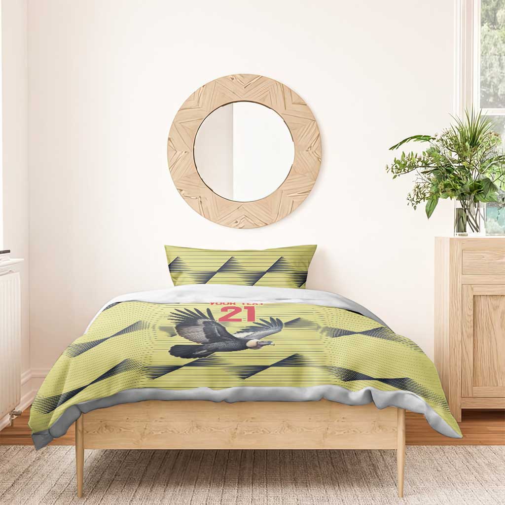 Yellow duvet and pillowcases with condor graphic and 21 on a bed