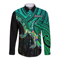 Green and black long sleeve button shirt with Maori-style tribal pattern, iridescent shell art