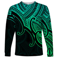Unisex long sleeve shirt in green and black with tribal Maori koru and geometric patterns