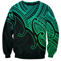 Green unisex sweatshirt with large koru-style tribal print and V-neck