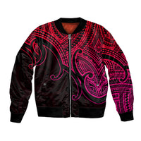 Pink and black bomber jacket with full-zip front, ribbed cuffs, and tribal koru graphic