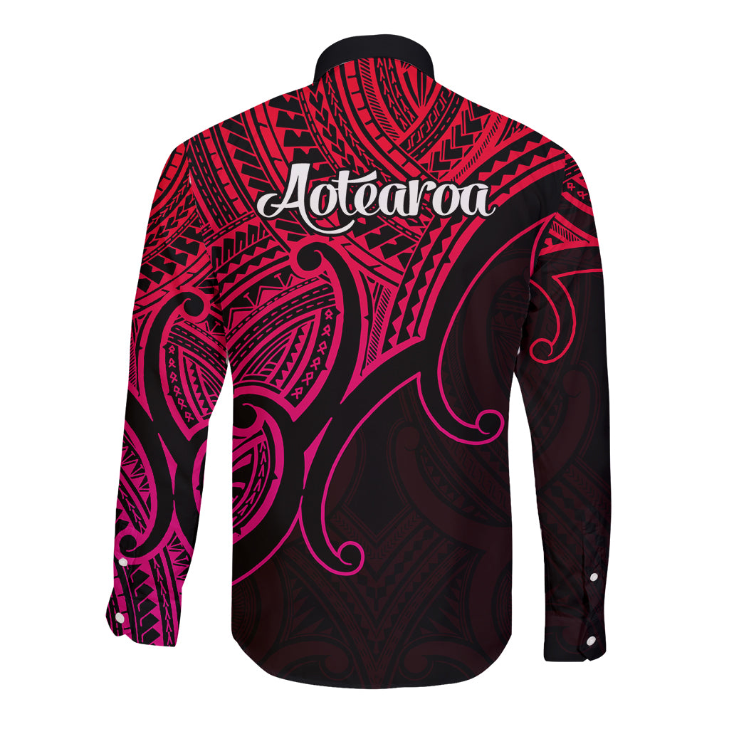 Long sleeve button shirt, black with pink tribal print and 'Aotearoa' on back