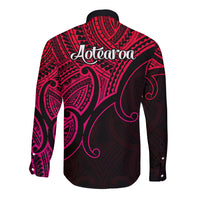 Long sleeve button shirt, black with pink tribal print and 'Aotearoa' on back
