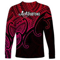 Unisex long-sleeve shirt with 'Aotearoa' text and pink-black Polynesian pattern