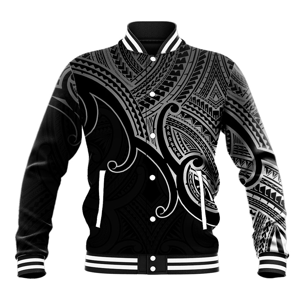 Black baseball varsity jacket with white striped ribbing and Polynesian koru artwork