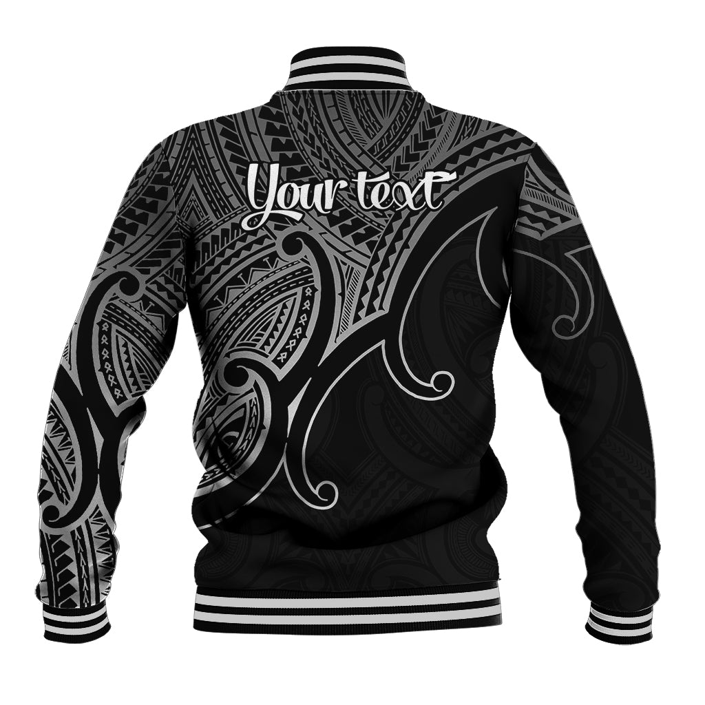 Black baseball jacket with white tribal patterns, striped cuffs, and 'Your text' on back
