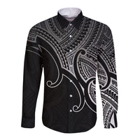 Black long-sleeve button shirt with bold Maori-style geometric and koru artwork
