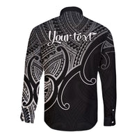 Black long-sleeve button shirt back with large Maori-style koru and geometric print