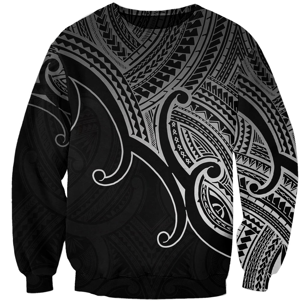 Black unisex sweatshirt with bold black-and-gray Polynesian koru tribal print, crew neck.