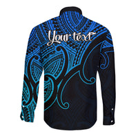 Long-sleeve button-up shirt with blue and dark tribal pattern; back shows 'Your text'