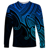 Unisex long-sleeve shirt with navy and blue Polynesian pattern, crew neck