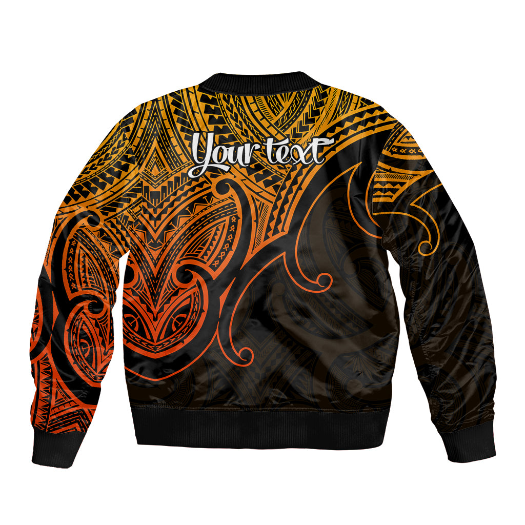 Gold and black bomber jacket with back print, ribbed hem and cuffs, tribal koru pattern