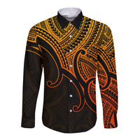 Gold and black long-sleeve button shirt with Polynesian tribal pattern and pointed collar