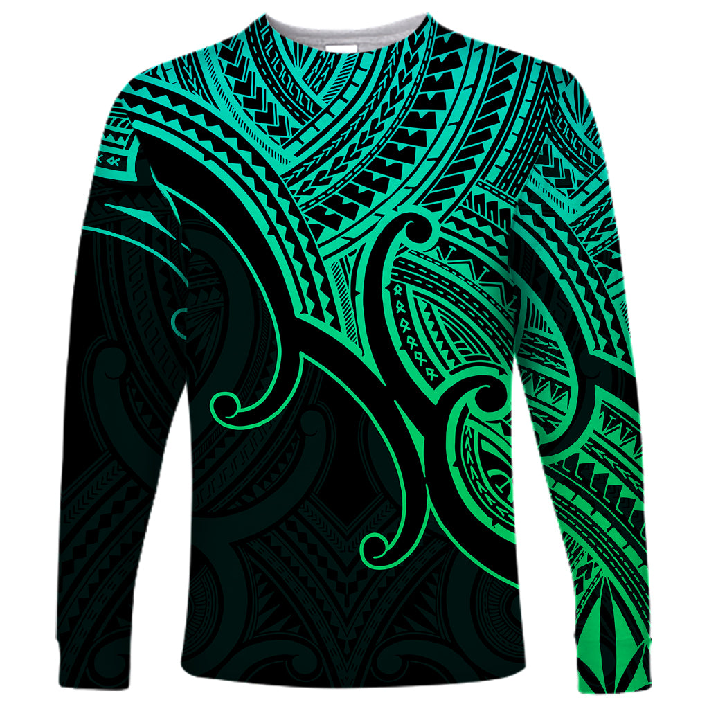 Unisex long-sleeve shirt with teal and black Polynesian koru-style pattern, front view