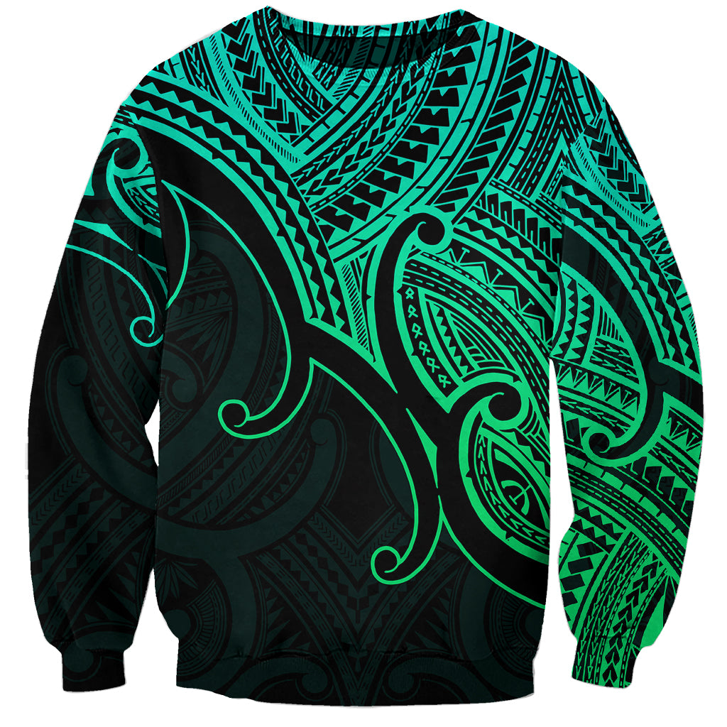 Unisex green crewneck sweatshirt with black Polynesian koru and tribal pattern