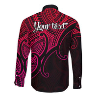 Long-sleeve button shirt, black with pink-and-red Polynesian print and 'Your text' on back